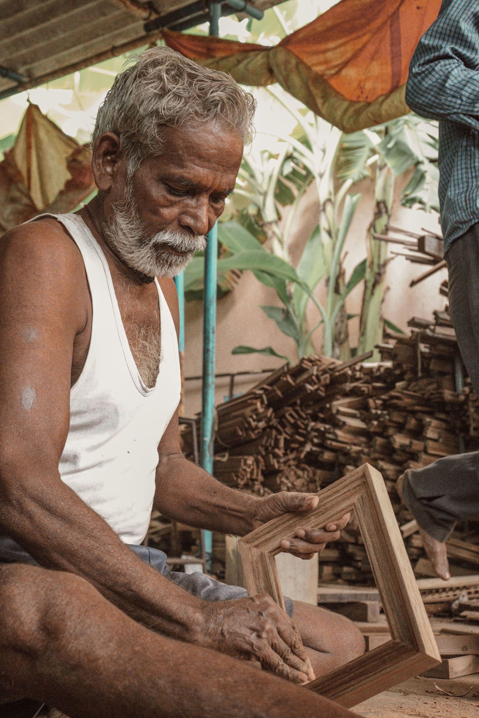 A carpenter assembling a frame